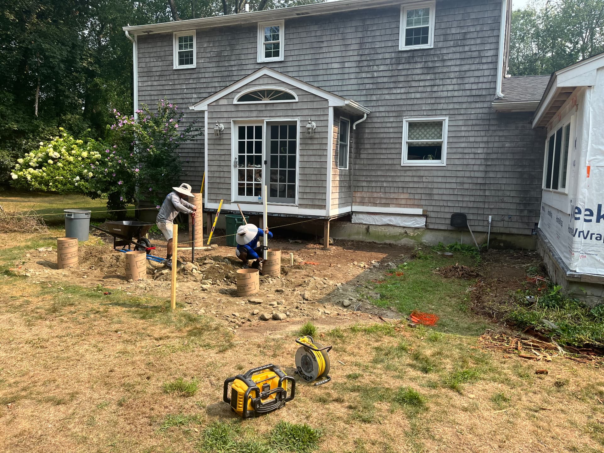 136 Rustic Acres — new deck footings being set