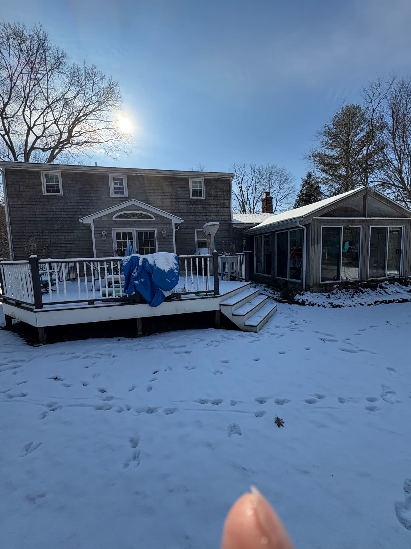 136 Rustic Acres — original rear of home and deck before work